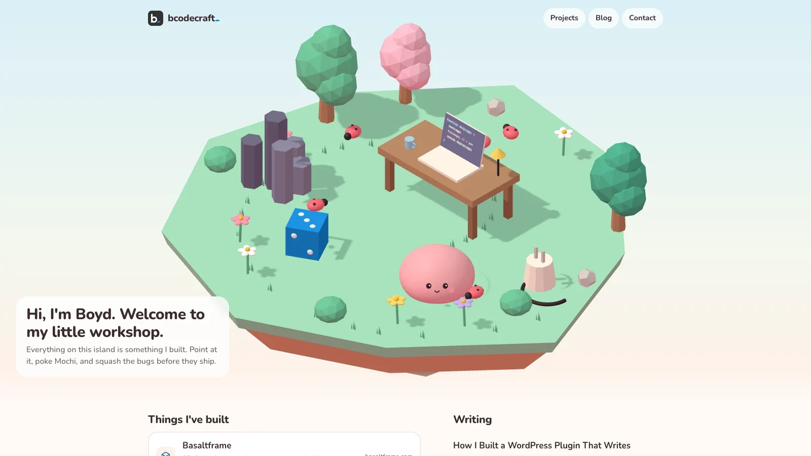 The bcodecraft.com homepage: a low-poly 3D island with a workbench, a pink Mochi, basalt columns, a blue die and a plug